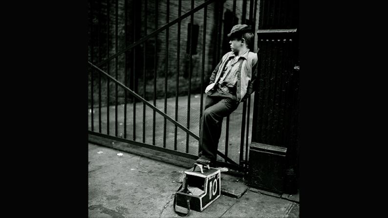 <em>Shoe Shine Boy -- Mickey with his shoe shine stand, 1947</em><br /><br />The editors of <em>Look</em> frequently commissioned photo essays of actors and other glamorous people at home. But in this unpublished series for the magazine, Kubrick followed a 12-year-old shoe shine boy named Mickey. <br /><br />"For this story he picked an ordinary child who is behaving like an adult because he is working all the time," says Ortner-Kreil. "The first photos show him in his professional surroundings counting change, waiting for a client, and shining shoes. Kubrick was only five years older than Mickey, and you can feel some connection between the two."