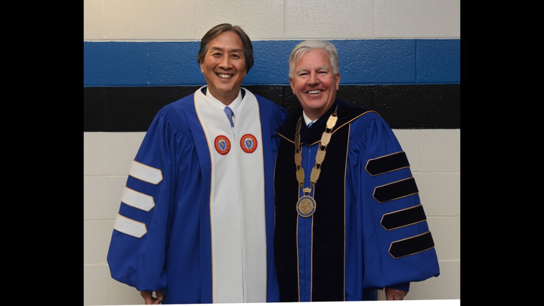 Howard Koh, assistant secretary for health of the U.S. Department of Health and Human Services, left, addressed graduates during a commencement ceremony at University of Massachusetts Lowell on May 17. He posed here with Marty Meehan, chancellor of the university.