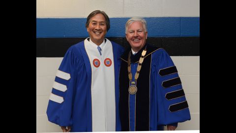 Howard Koh, assistant secretary for health of the U.S. Department of Health and Human Services, left, addressed graduates during a commencement ceremony at University of Massachusetts Lowell on May 17. He posed here with Marty Meehan, chancellor of the university.