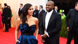 NEW YORK, NY - MAY 05: Kim Kardashian (L) and Kanye West attend the "Charles James: Beyond Fashion" Costume Institute Gala at the Metropolitan Museum of Art on May 5, 2014 in New York City.  (Photo by )