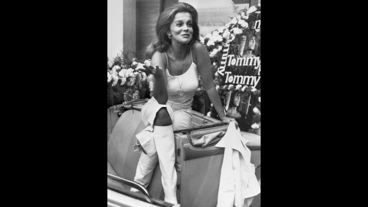 Swedish-American actress Ann Margret rides around the streets of Cannes in all white during a photo call in 1975. Margret used her backcombed hair and white leather boots to promote British film director Ken Russell's musical film "Tommy" in which she played Nora Walker. 
