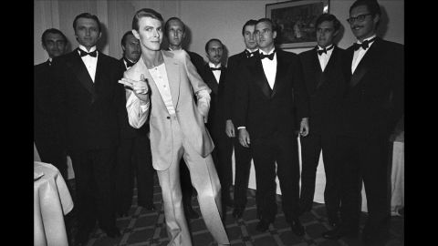 David Bowie shows his bow-tied entourage how to throw shapes during the 31th Cannes Film Festival in 1978. 