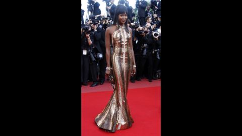 Naomi Campbell lit up the red carpet in this discoball of a dress, which is custom made Robert Cavalli, as she arrived for the screening of "Biutiful" in 2010. 
