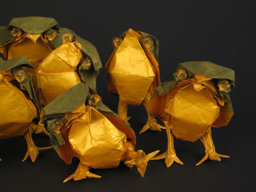 Origami artist Bernie Peyton created each of these baby owls using just one sheet of paper, which was gold on one side and green on the other.