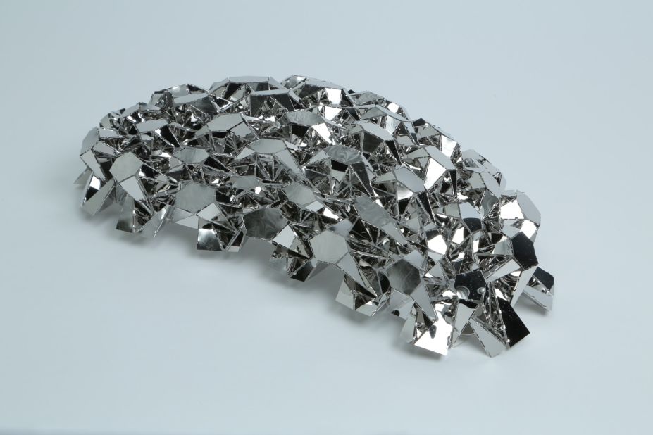 Tomohiro Tachi of Japan created this shiny work. "I find that the Japanese tend to be more calculated and precise with their folding," Nguyen says, "which can allow for a huge amount of detail and complexity."