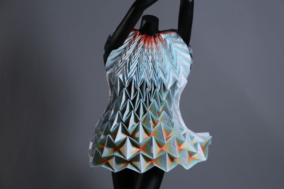 "I am also showing the many genres of origami, including a fashion segment, which isn't typically considered to be a standard category of origami," Nguyen says. Shown here is the "Enfaltung" dress by designer Jule Waibel . 