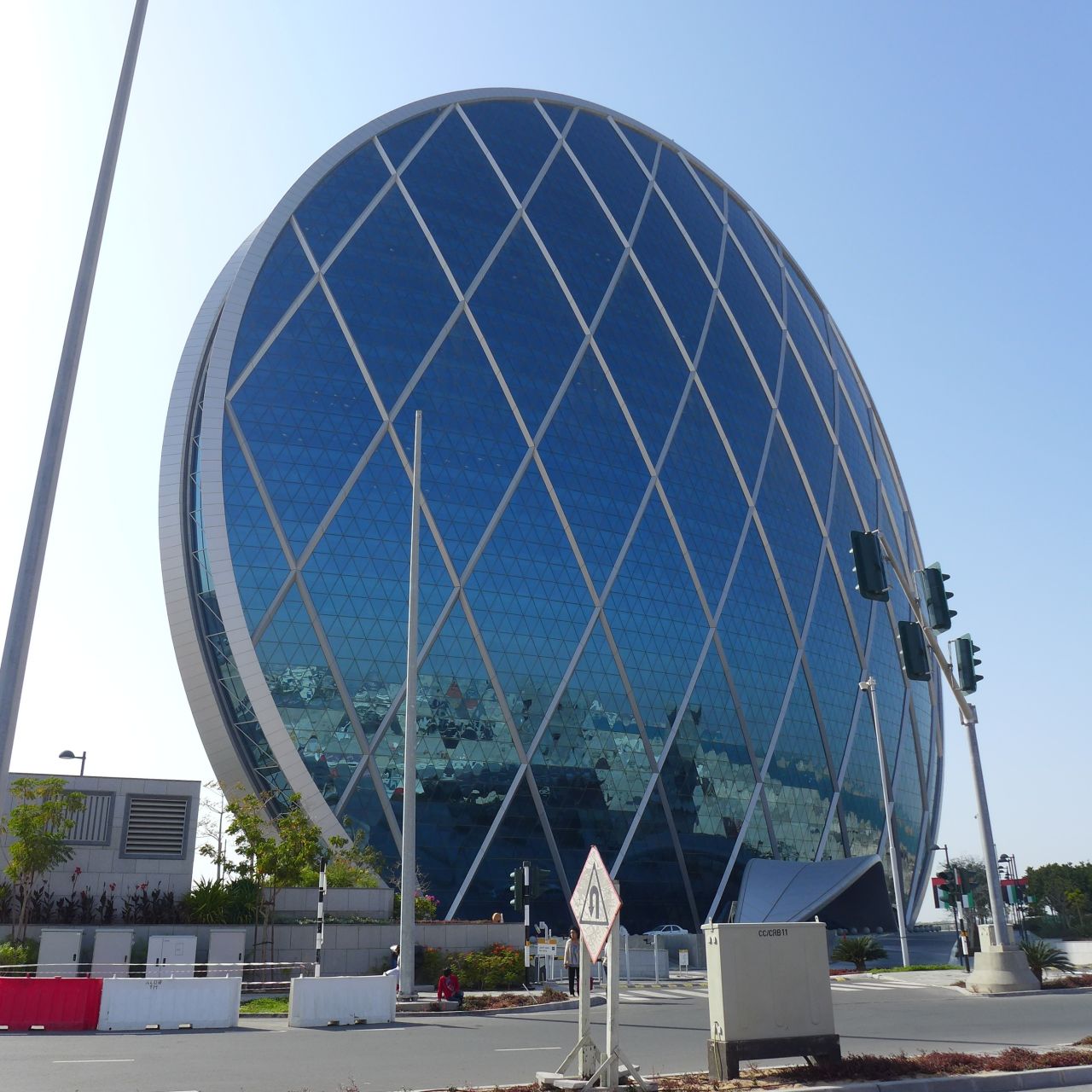 Completed in 2010 in Al Raha Beach, United Arab Emirates, the <a href="http://www.aldar.com/en/project/projects/hq-1" target="_blank" target="_blank">Aldar Headquarters building</a> resembles a glass-covered wheel. The 23-story office space follows LEED standards for environmentally exceptional buildings. It has has become a city landmark, says <a href="http://ireport.cnn.com/docs/DOC-1123294">Devi Trianna</a>, who predicts the cities of the future will be more environmentally friendly. 