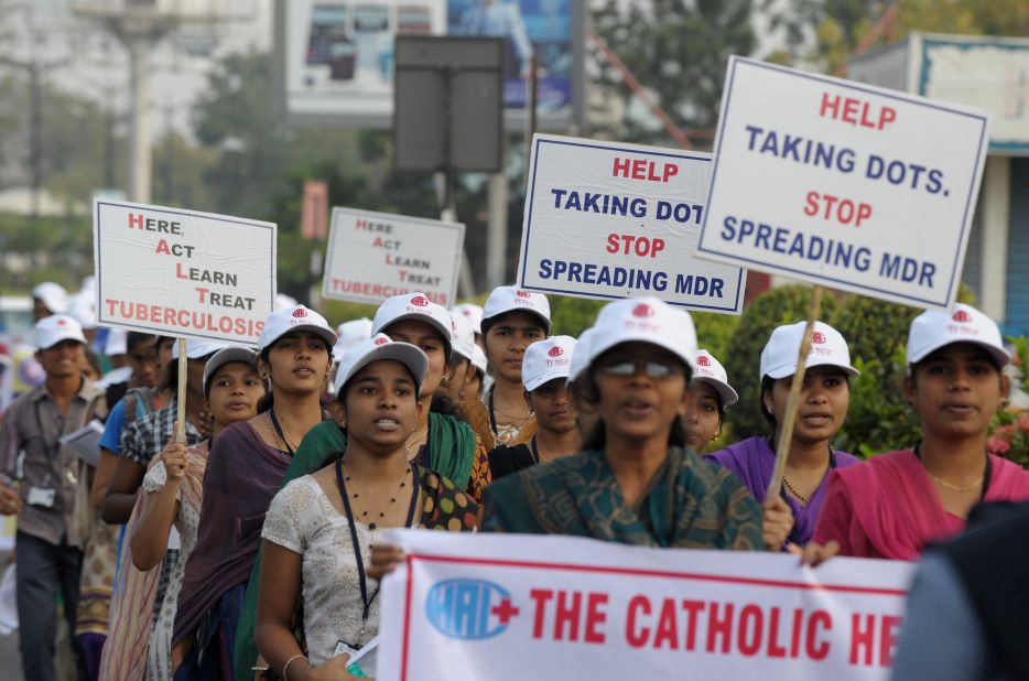 Pictured, Indian nursing students at an awareness rally in Hyderabad, on March 24, 2014. Their placards are encouraging "DOTS" the WHO's TB control strategy that includes effective testing and a reliable drug supply.