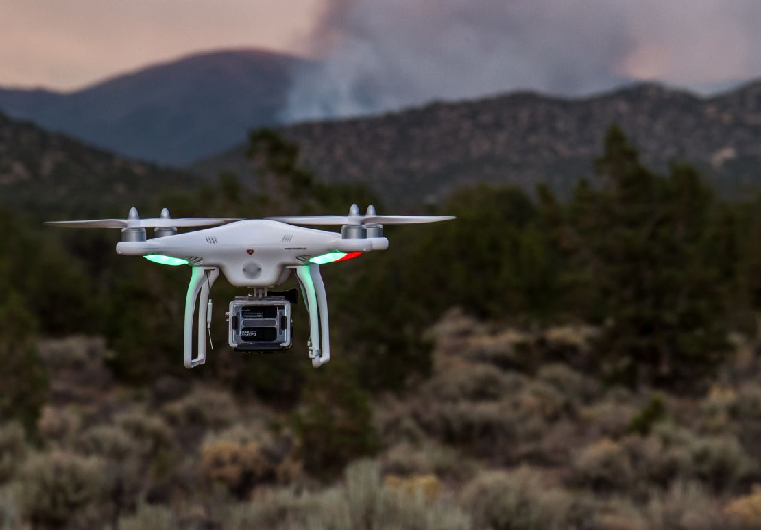 A DJI Phantom drone captured in action.