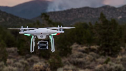 A DJI Phantom drone captured in action.
