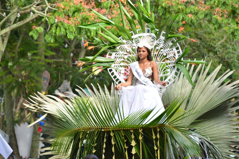 Miss Seychelles leads the procession. 