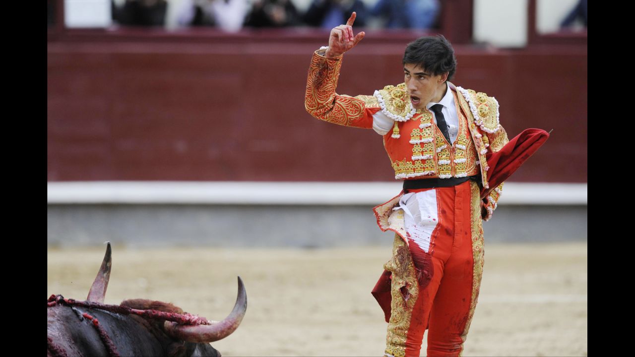 Matador Saul Jimenez Fortes performs during the San Isidro bullfighting festival in Madrid on Tuesday, May 20. For the first time in 35 years, the festival was suspended on Tuesday after Jimenez and two other matadors were injured.