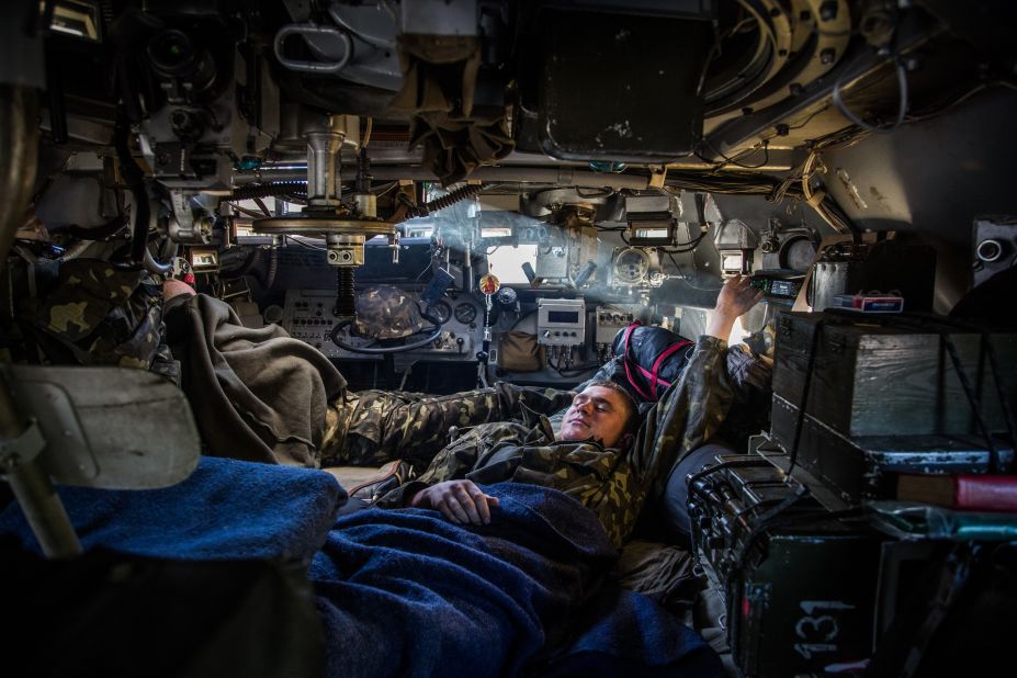 A Ukrainian soldier rests inside an armored personnel carrier at a checkpoint near Slovyansk on Wednesday, May 21. 