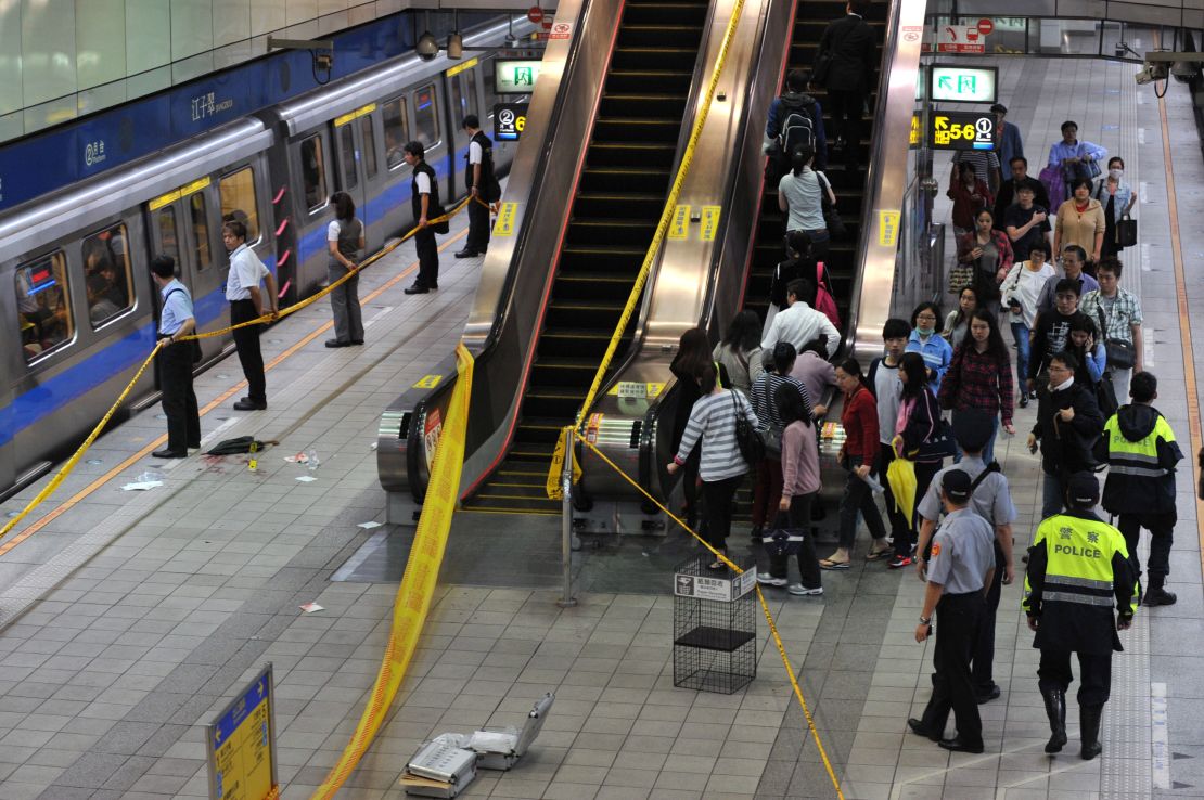 Police blockade the scene at Jiangzicui station.