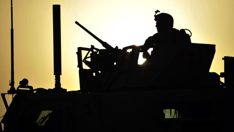 A  U.S. Marine stands guard in Afghanistan's Helmand Province in on May 9, 2011. 
