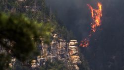 The Slide Fire burns near 89 A south of Flagstaff, Wednesday, May 21, 2014.  Evacuations of surrounding areas took place late afternoon Tuesday. (AP Photo/The Arizona Republic, Tom Tingle)