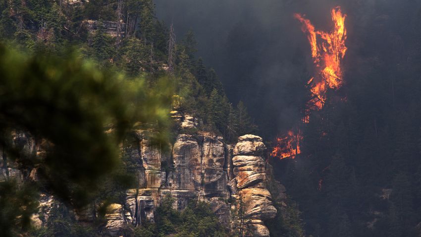 The Slide Fire burns near 89 A south of Flagstaff, Wednesday, May 21, 2014. Evacuations of surrounding areas took place late afternoon Tuesday. (AP Photo/The Arizona Republic, Tom Tingle)