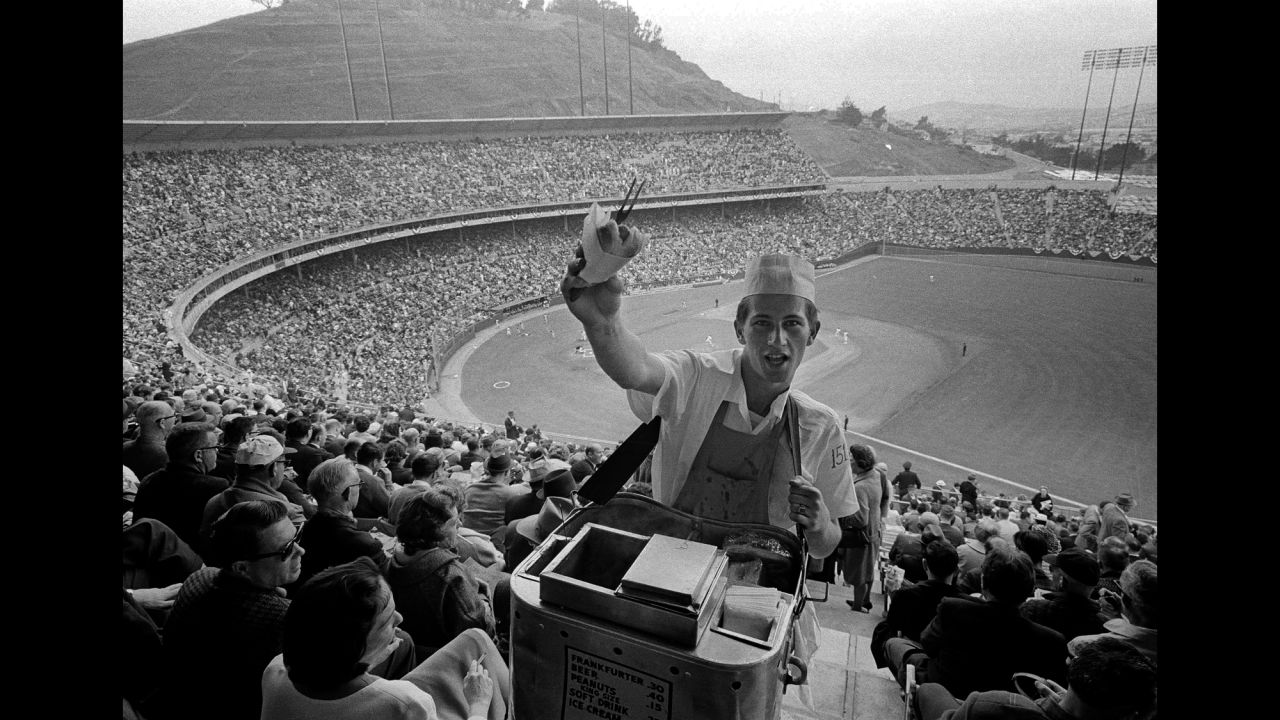 A vendor sells hot dogs at Candlestick Park in 1965 for the San Francisco Giants' season-opening home game against the Pittsburgh Pirates.