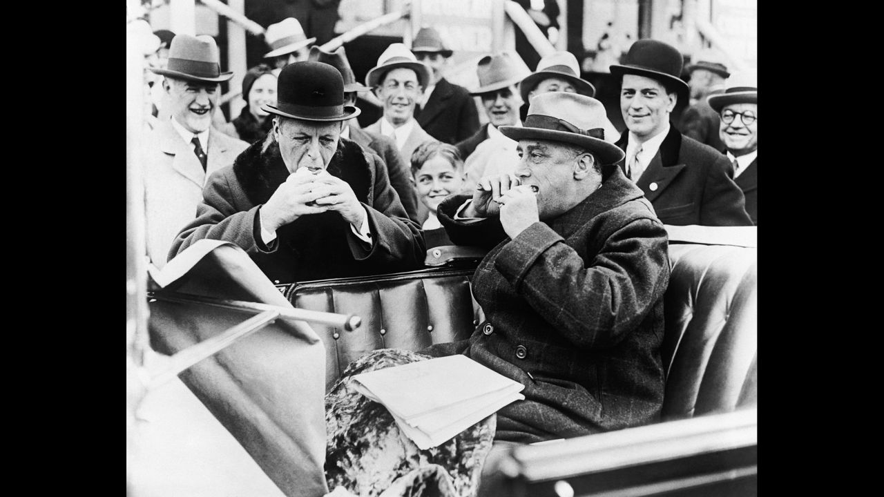 Massachusetts Gov. Joseph Ely, left, and New York Gov. Franklin D. Roosevelt stop for a hot dog on the Mohawk Trail in Massachusetts, where the two campaigned together in 1932.