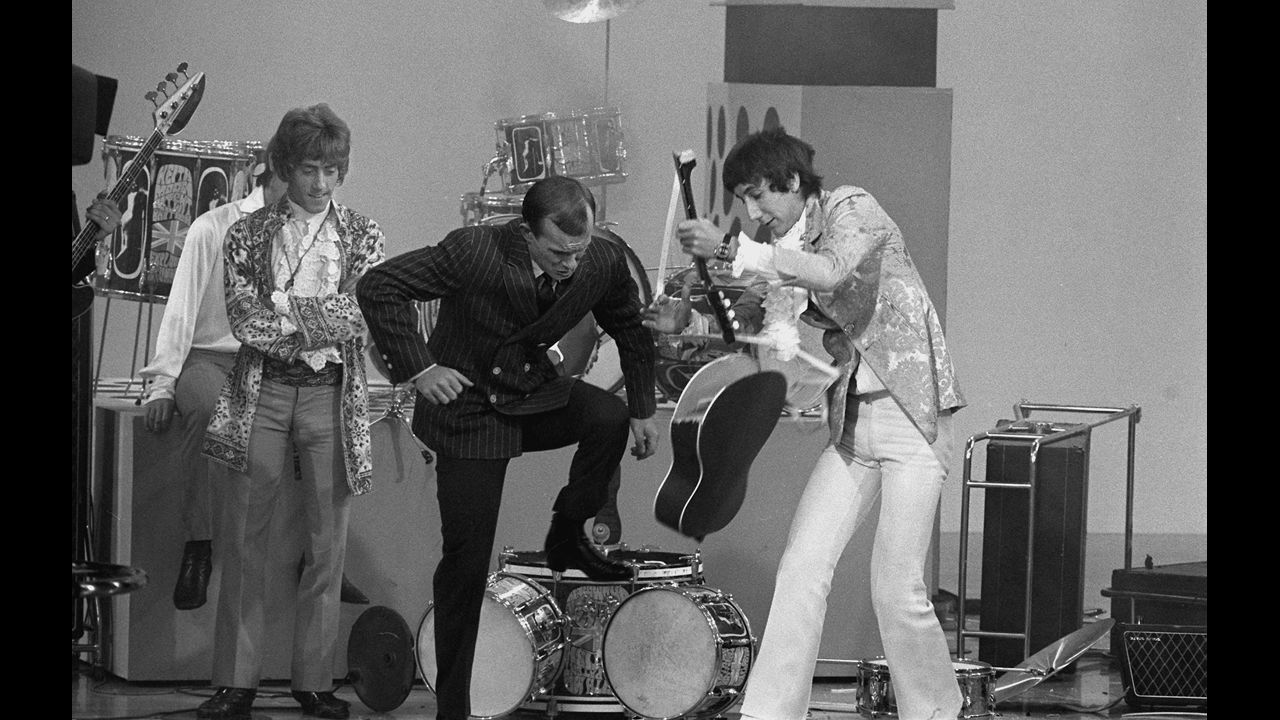 "The Smothers Brothers Comedy Hour" had a countercultural bent that regularly raised hackles -- and delighted fans. Here, The Who's Pete Townshend, right, helps host Tom Smothers destroy his acoustic guitar as singer Roger Daltrey looks on following The Who's performance of "My Generation." The Smothers' battles with their network, CBS, would eventually lead to the show's cancellation. 