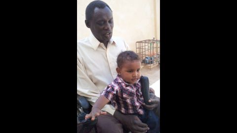 Daniel Wani and his son Martin.       