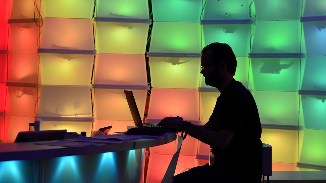 Participants attend the annual Chaos Communication Congress on December 28, 2013 in Hamburg, Germany. 
