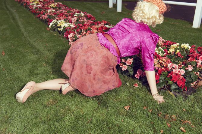 The photographer donned wigs and thrift store costumes, for the shoot at race courses across Paris. "I found that it added a certain ambiguity and uncanniness to the scene when I was partially hidden or when my face was unseen. It seems more ominous," said Roy.