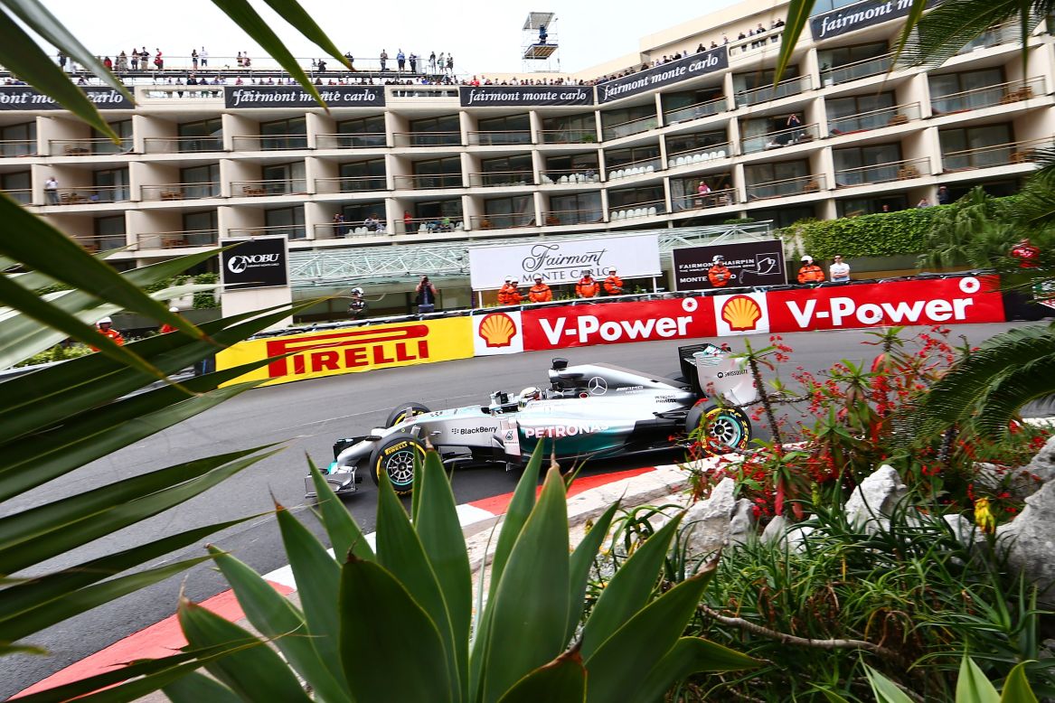 The party is held at the Fairmont hotel which sits on the famous hairpin of the Monte Carlo street circuit. Here Lewis Hamilton curves his Mercedes car past the four-star hotel during the Monaco Grand Prix.