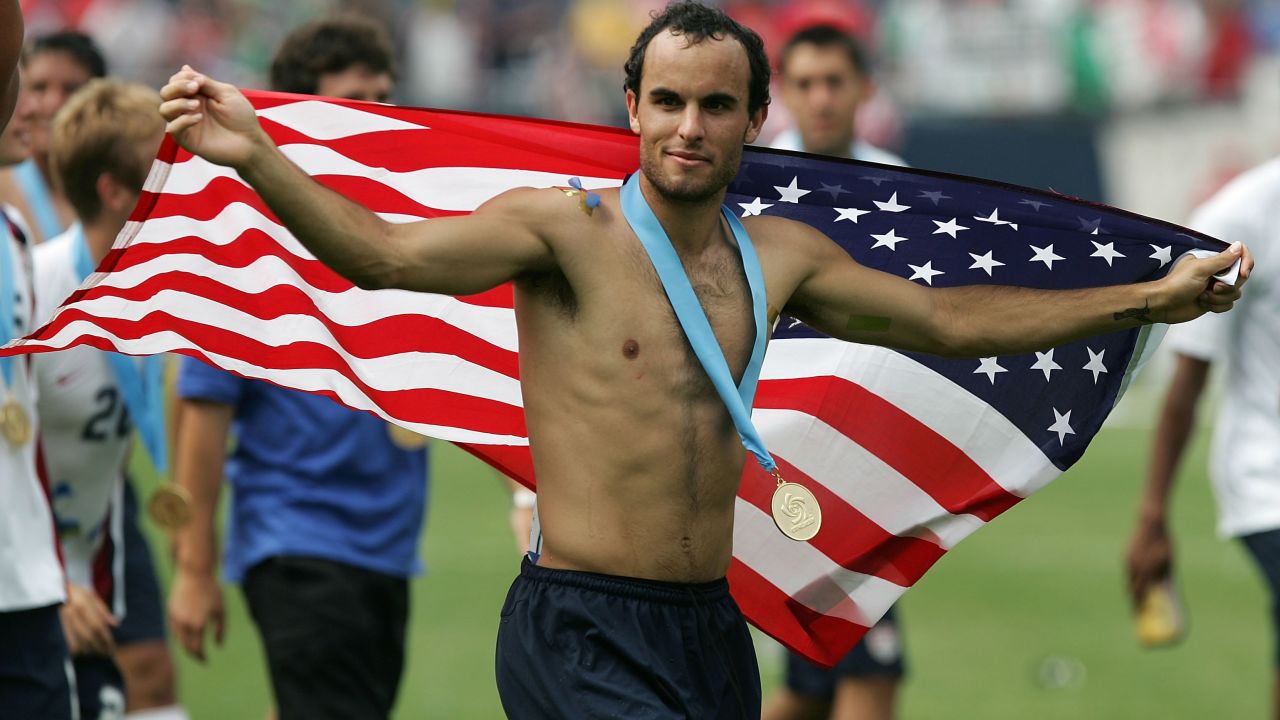 Donovan celebrates at Chicago's Soldier Field after a 2-1 win over archrival Mexico during the 2007 CONCACAF Gold Cup tournament. The United States won the Cup with the help of four goals from Donovan, who would tie Eric Wynalda as the club's all-time leading scorer that year. 