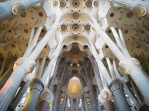 When you think "futuristic buildings," a large Roman Catholic church might not come to mind. But <a href="index.php?page=&url=http%3A%2F%2Fireport.cnn.com%2Fdocs%2FDOC-1135906">Timothy Holm</a> begs to differ after seeing the Basilica i Temple Expiatori de la Sagrada Familia in Barcelona, Spain. Designed by  Catalan architect Antoni Gaudi in the 1880s, the building has yet to be completed. The anticipated finish date is 2026, the 100th anniversary of the architect's death.