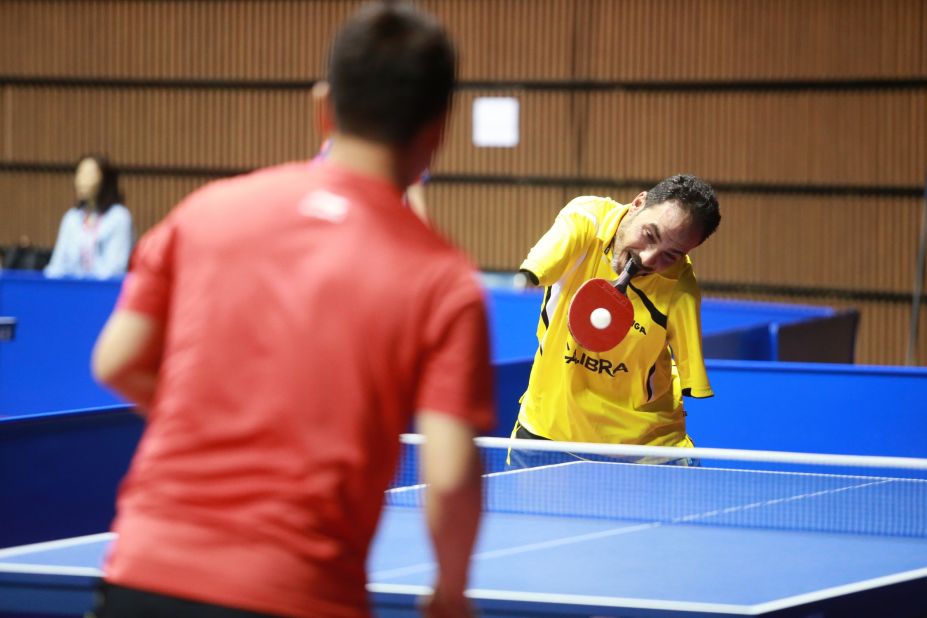 Hamadto started playing table tennis at 13, three years after losing both his arms in a train accident.