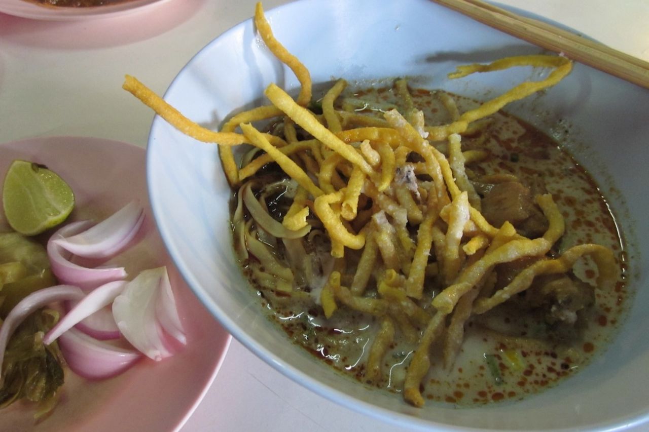 Khao Soi is a dish of noodles bathed in an intense curry broth topped with crispy noodles. One bowl at Samoer Jai, a Chiang Mai institution, is never enough. 
