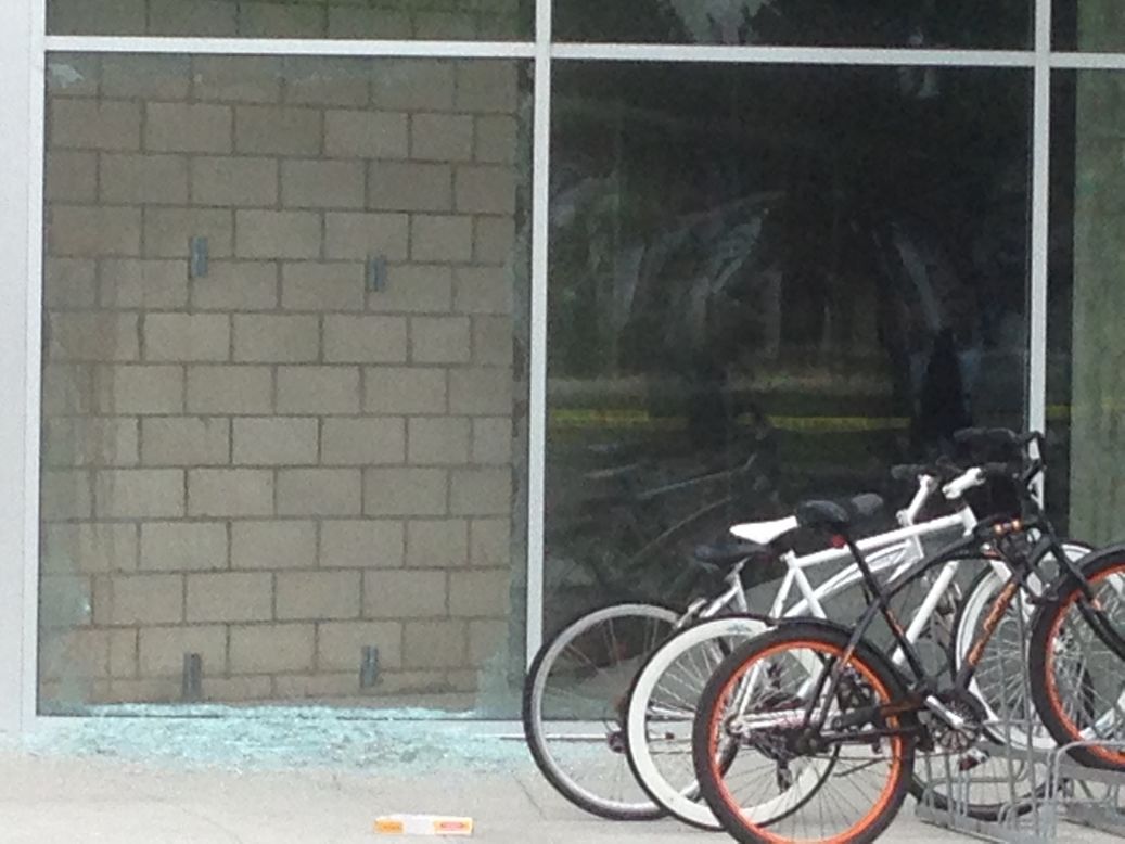 Broken glass at the shooting scene Saturday.  Authorities said there were multiple crime scenes. 