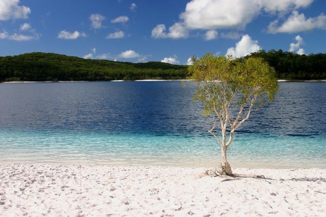 The incredible crystal blue waters and  white sand along its shores means there are no more perfect puddles on earth than Australia's Lake McKenzie.