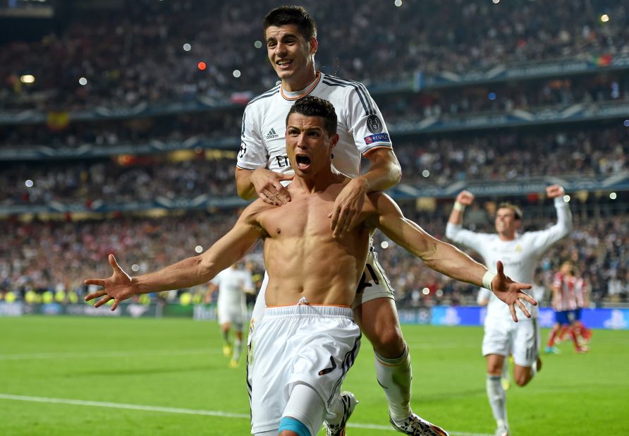 Ronaldo celebrates his late penalty to round off the scoring in the final against Atletico.