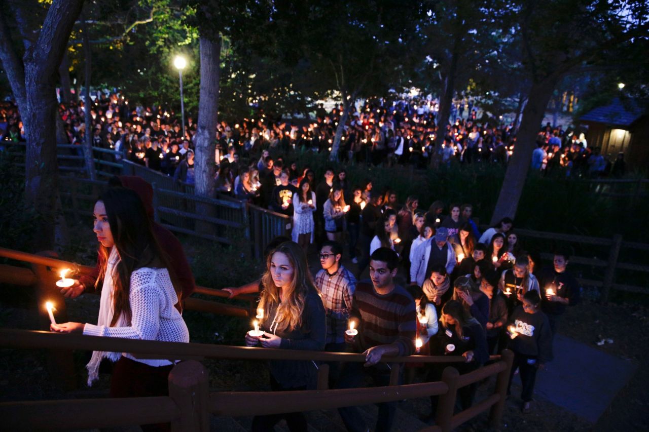 People gather at a park in Isla Vista for the May 24 vigil.