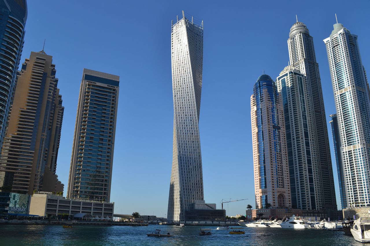 The 80-story <a href="http://ireport.cnn.com/docs/DOC-1129094">Cayan Tower</a> is a residential building in Dubai, United Arab Emirates. "Its unique helix-shaped design is futuristic because it redefines what one might think of as the 'normal' architectural characteristics of a skyscraper," said iReporter Lynda Martinez. 