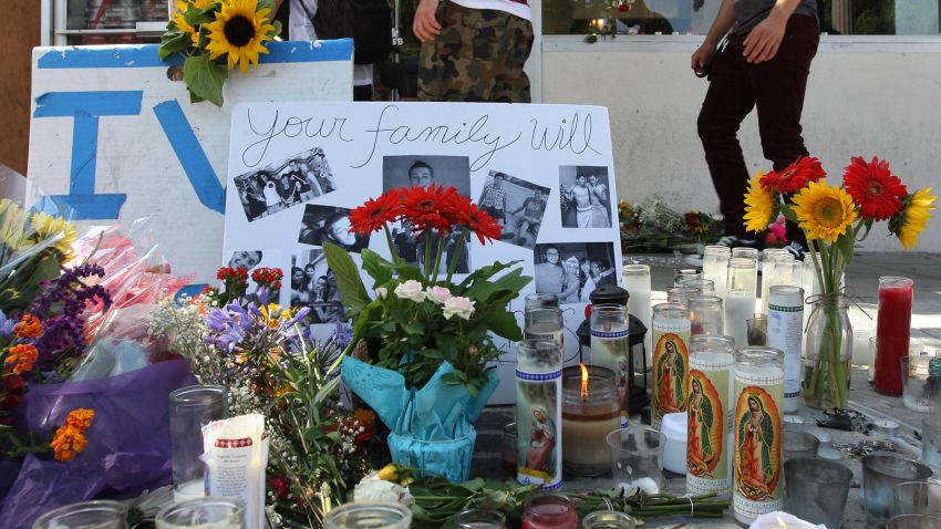 A makeshift memorial has been set up in front of the IV Deli, one of the crime scenes in  Isla Vista, California on Sunday, May 25. 