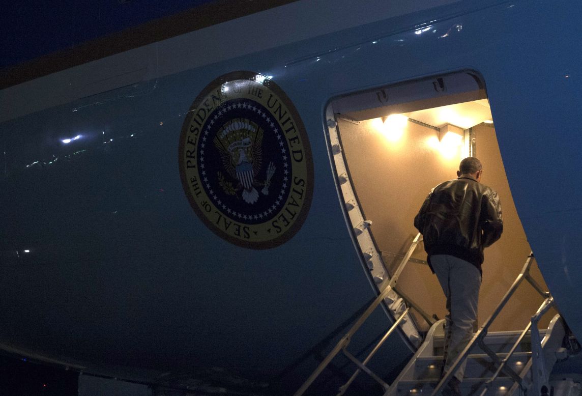 President Barack Obama boards Air Force One before departing Bagram Air Field. Obama landed Sunday, May 25, in Afghanistan for an unannounced trip to visit with U.S. forces on Memorial Day weekend. He thanked the troops for their service as the United States hands over responsibility to Afghan forces.