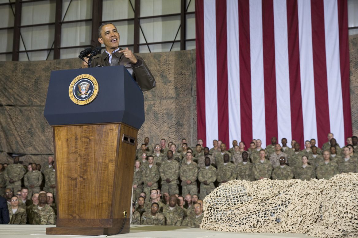 Obama speaks during a troop rally after arriving at Bagram Air Field.