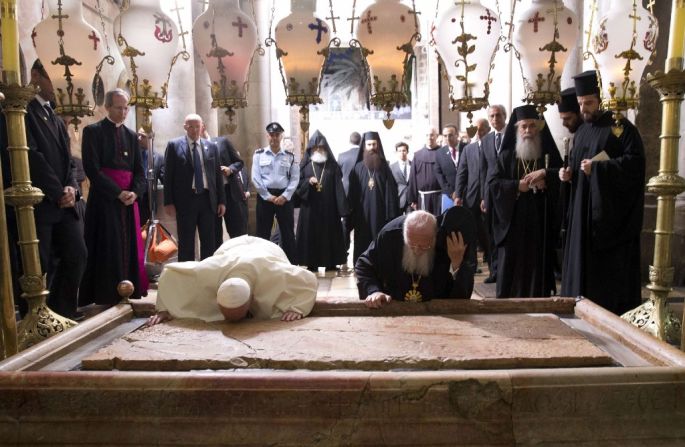 Francis and Ecumenical Patriarch of Constantinople Bartholomew I pray over the Stone of Unction at the Church of the Holy Sepulchre in Jerusalem's Old City on Sunday, May 25. The Pope joined Bartholomew in a historic joint prayer for Christian unity at Christianity's holiest site in Jerusalem.