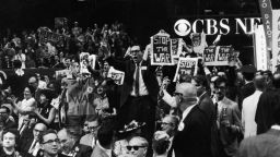 1968, Members of the New York delegation protesting against the Vietnam War during the Democratic National Convention held at Chicago, Illinois. They are holding 'Stop the War' signs. (Photo by Washington Bureau/Getty Images)