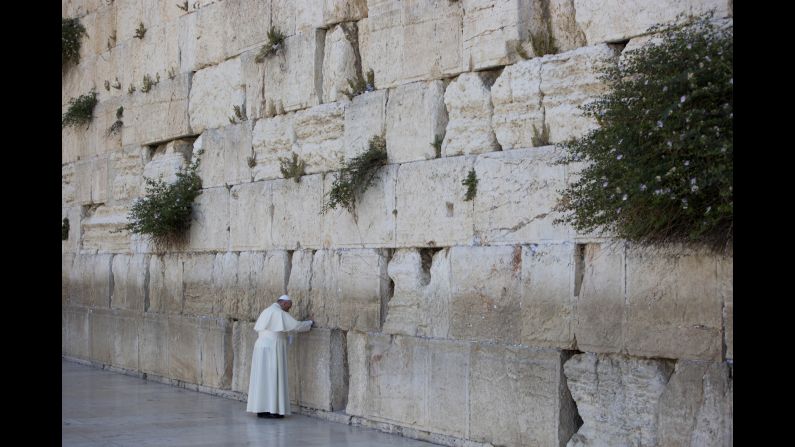 Pope Francis prays in front of the Western Wall in Jerusalem's Old City on Monday, May 26. The Pope has been on a three-day historic trip to the Middle East, his first as leader of the Roman Catholic Church.