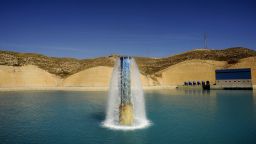 Fresh water flows into a reservoir after treatment at a desalination plant near Almeria, southern Spain.