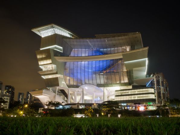 Sean Lowcay describes <a href="index.php?page=&url=http%3A%2F%2Fireport.cnn.com%2Fdocs%2FDOC-1128656">the Star</a> Performing Arts Centre in Singapore, as an architectural explosion of shapes and ideas. The 15-story structure also functions as a civic and cultural center. At the top of the building, there are 5,000 seats designated for theater performances and church events.