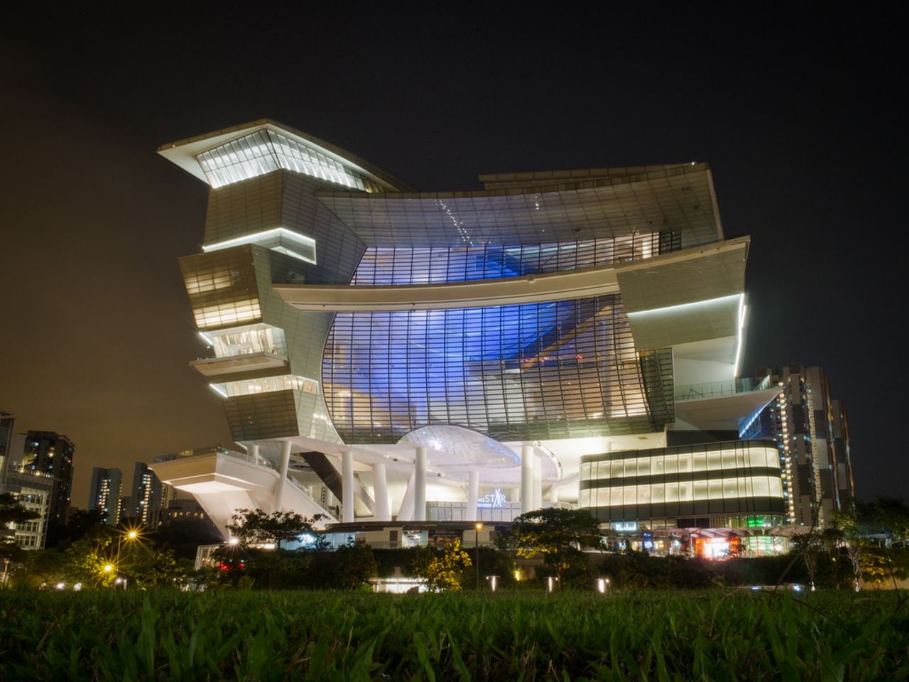 Sean Lowcay describes <a href="http://ireport.cnn.com/docs/DOC-1128656">the Star</a> Performing Arts Centre in Singapore, as an architectural explosion of shapes and ideas. The 15-story structure also functions as a civic and cultural center. At the top of the building, there are 5,000 seats designated for theater performances and church events.