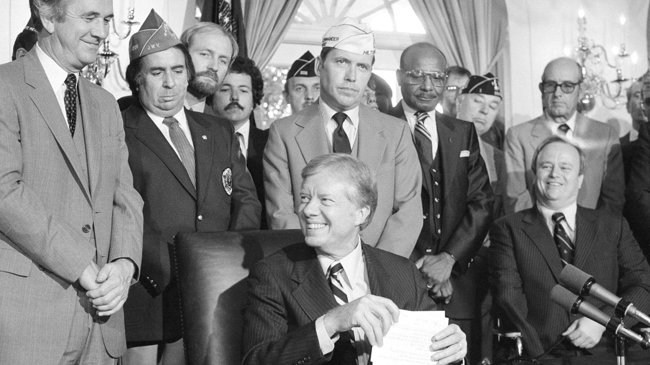 President Jimmy Carter after signing the 1980 Veterans Rehabilitation and Education Amendment, which increased job training and educational benefits for vets.