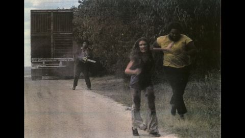 Hansen, left, as Leatherface in 1974's "The Texas Chainsaw Massacre."