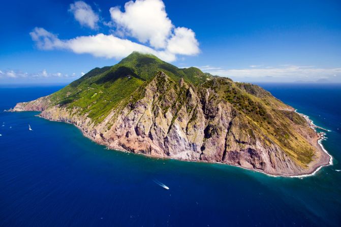 Like Saba (pictured), a few captivating islands in the remote fringes of the Caribbean, Pacific and Atlantic still belong to some of the world's more powerful nations. Here's a look at some of them. 