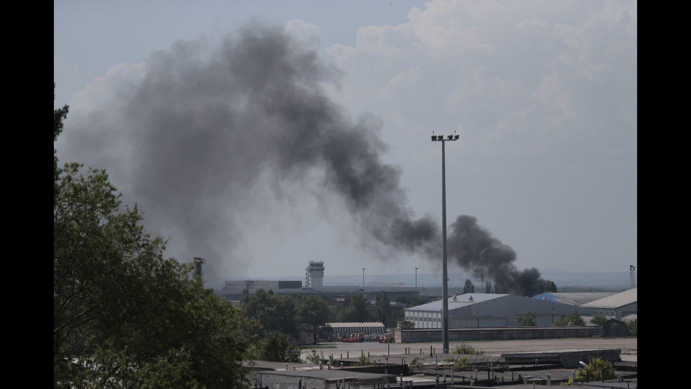 Smoke rises from the airport on May 26 after an airstrike by the Ukrainian military.